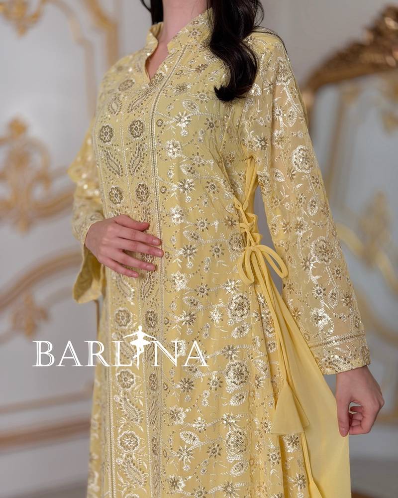 jalabeya with white embroidery and a side tie