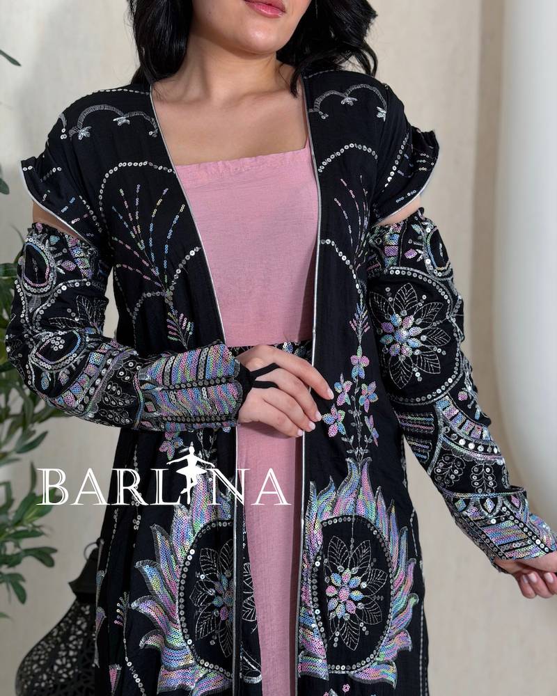 Pink jalabiya with a black embroidered cape
