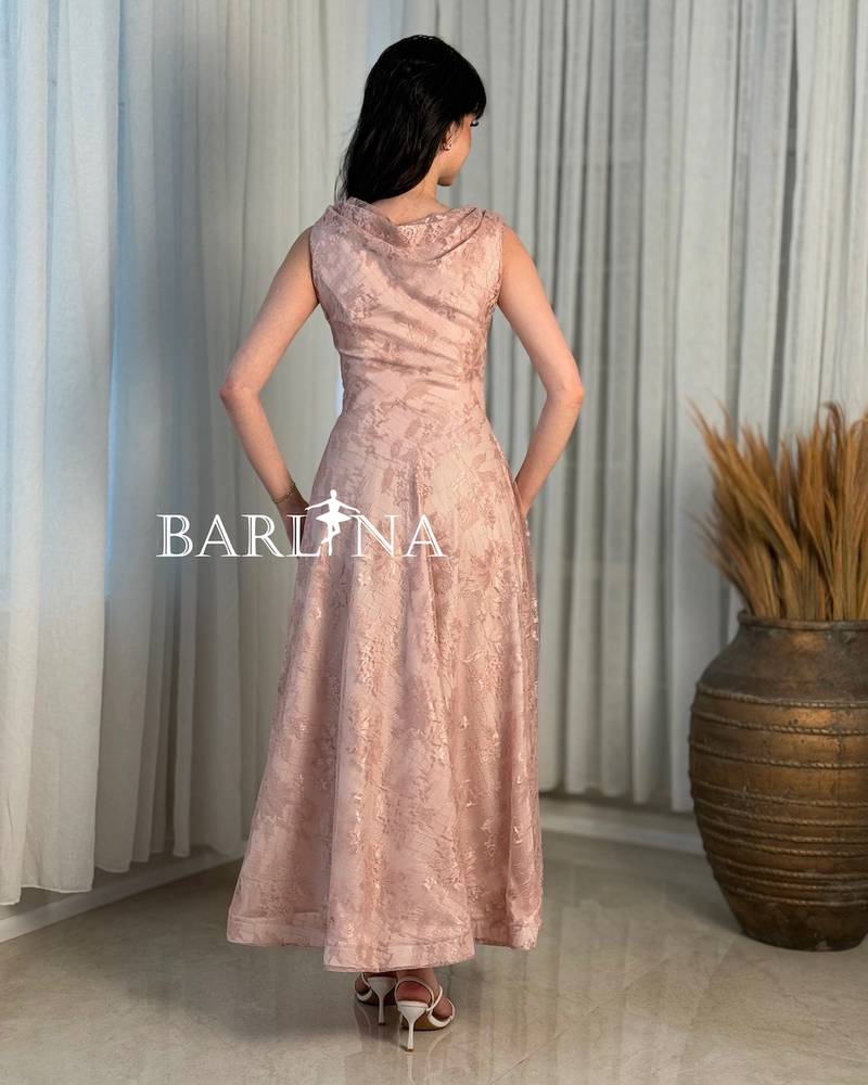 Light pink lace dress with a flared cut