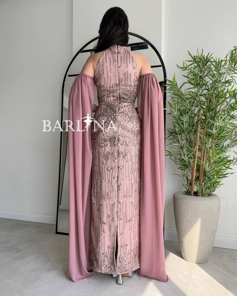 Nude dress with long off-shoulder sleeves