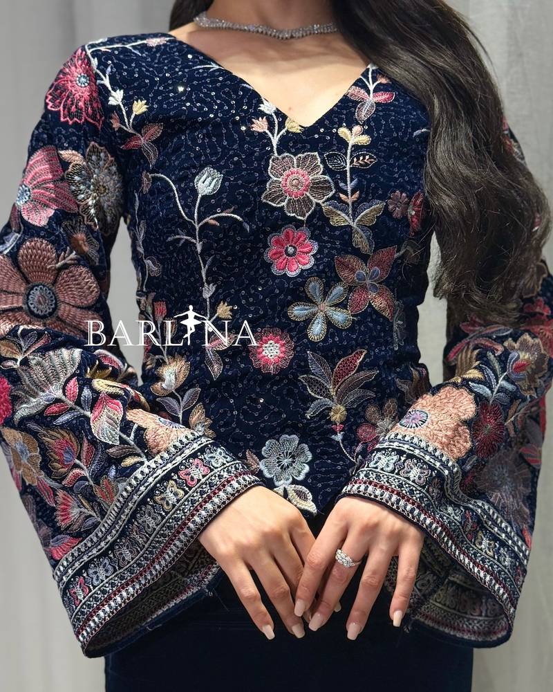 navy velvet jalabiya with an embroidered floral bodice