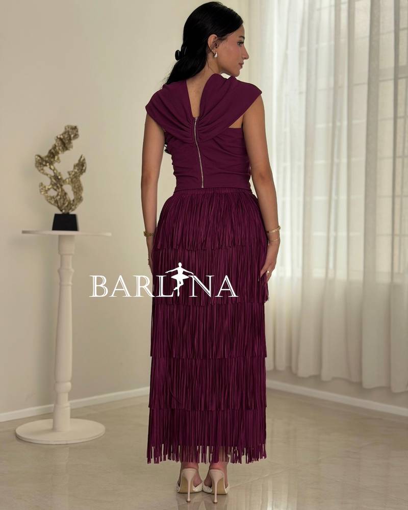 Set with a skirt decorated with soft fringe