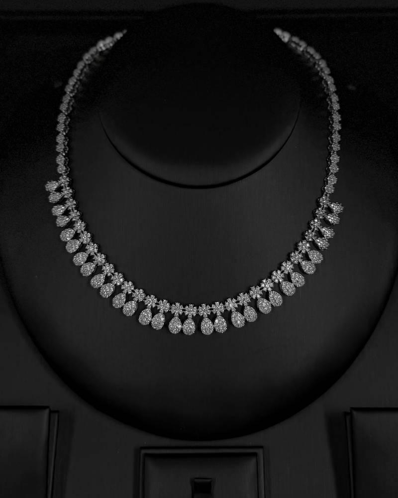 Elegant accessory set with a repeating, draped design