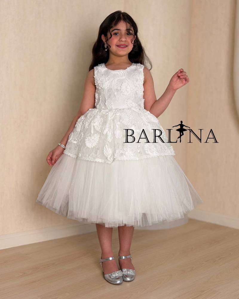 White girl's dress with prominent lace details