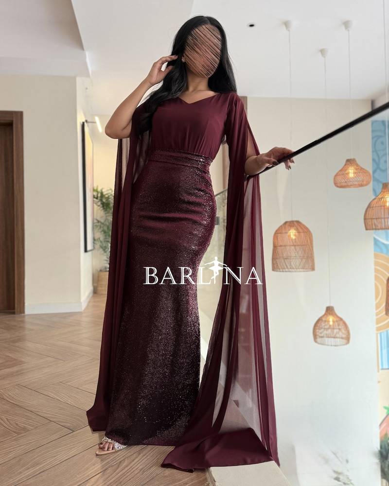 Burgundy dress with long flowing sleeves