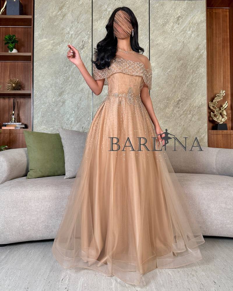 Beige off-the-shoulder dress with shiny embroidery