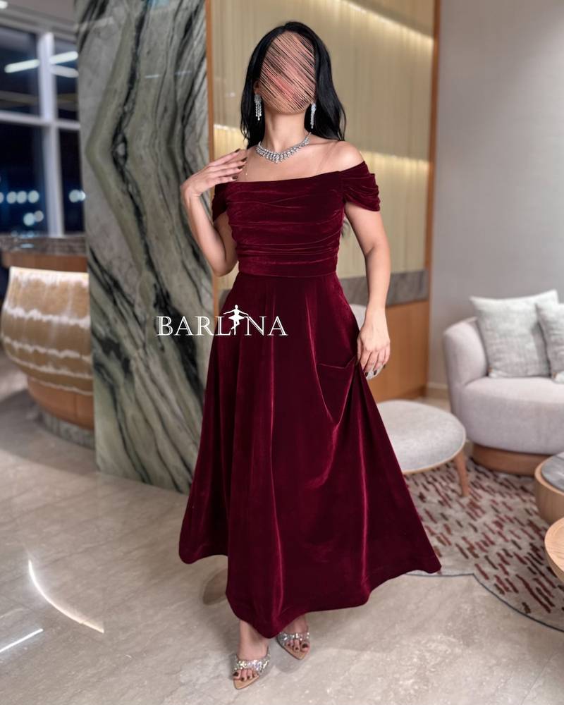 Burgundy velvet dress with soft pleats