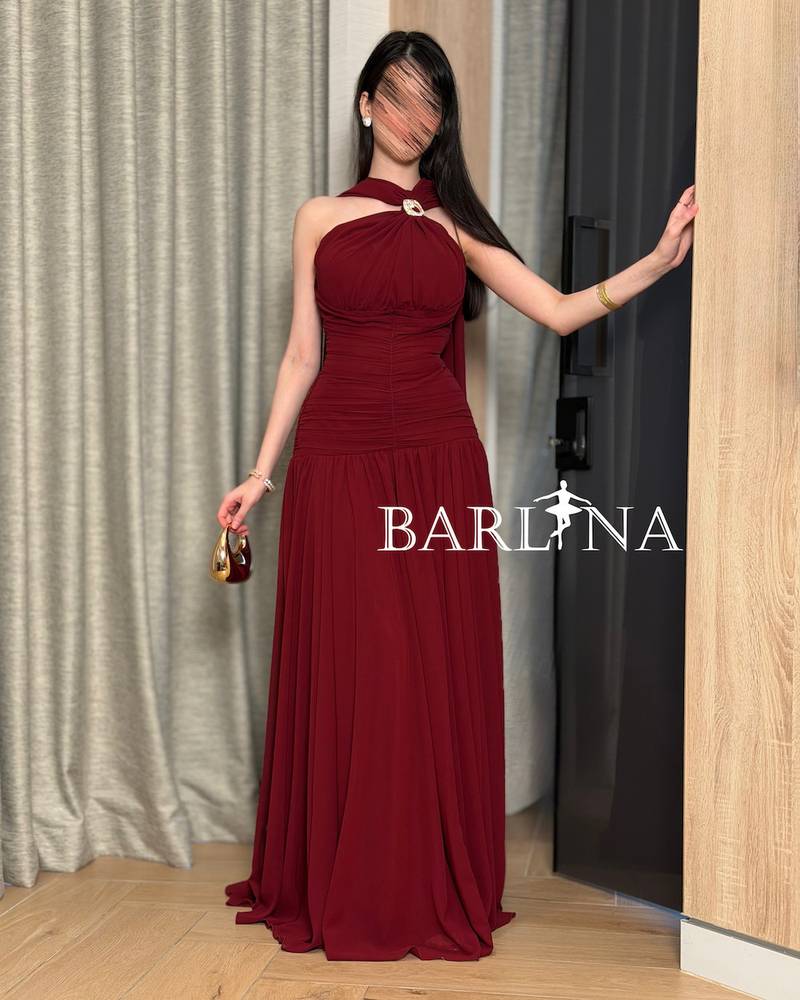 Burgundy dress with soft pleats and halter neck design