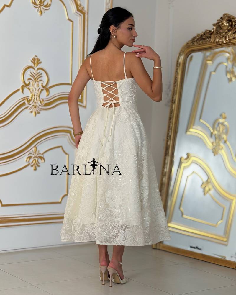 Off-white embroidered dress, soft and sleeveless