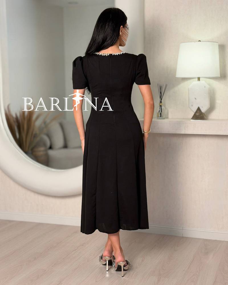 A soft dress with a sophisticated classic cut.
