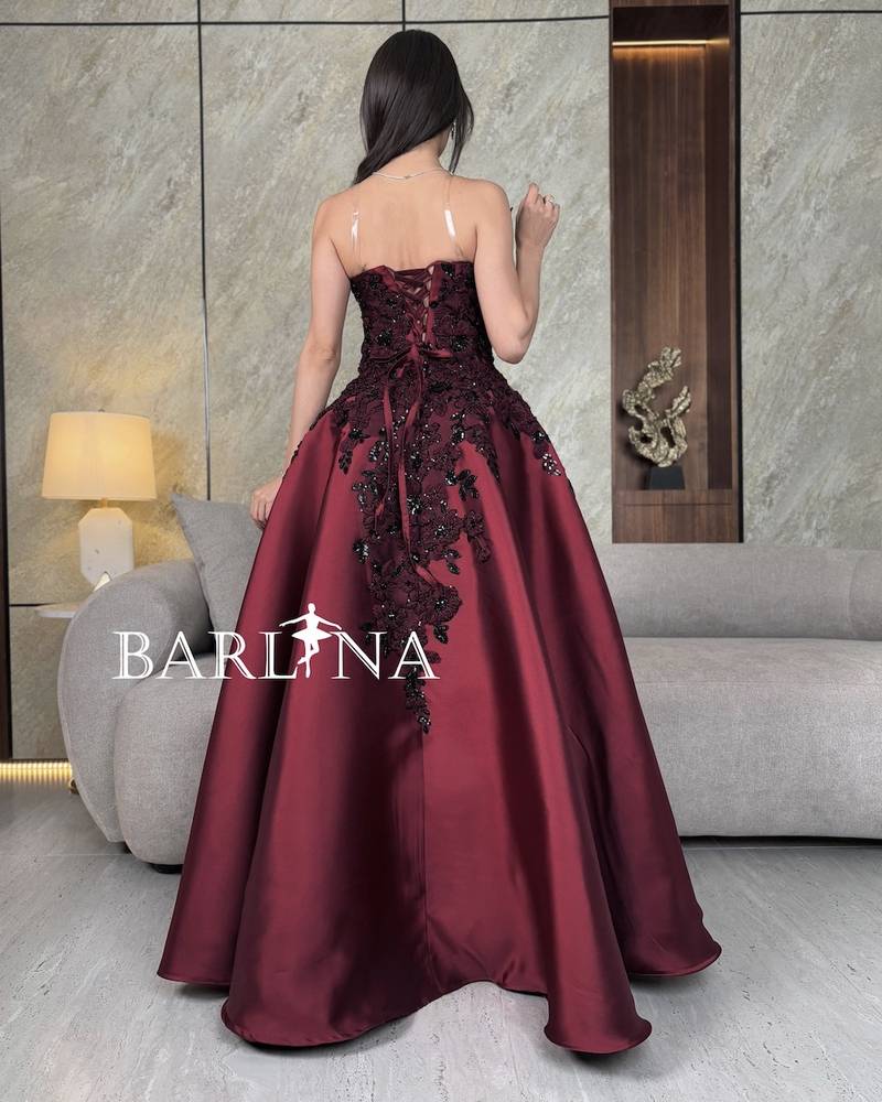 Burgundy evening dress with a wide collar and no sleeves