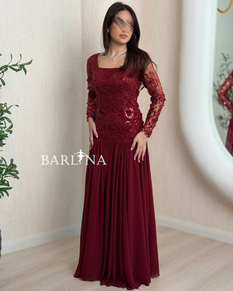 Elegant burgundy dress with pleats and sequin embroidery