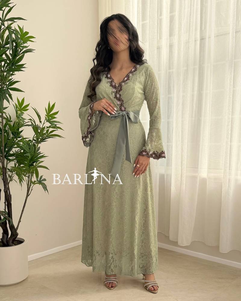 Light green lace dress with bell sleeves