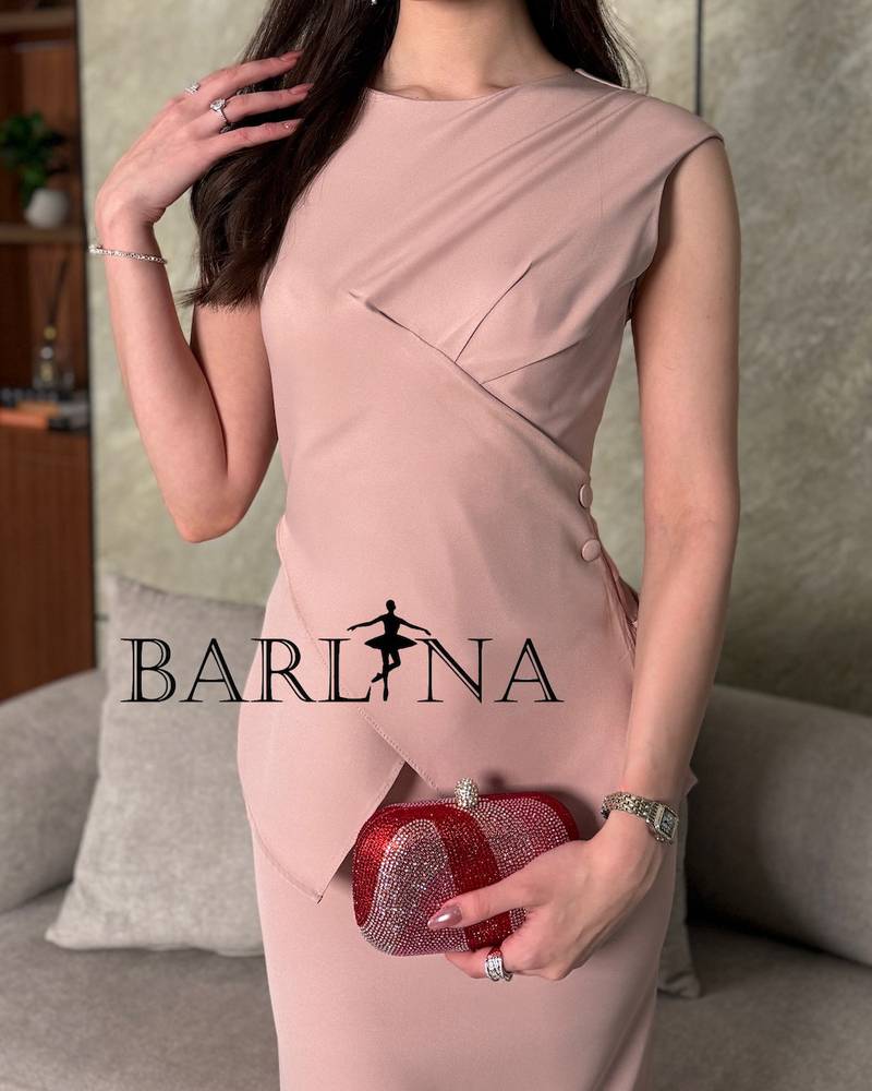 Pink two-piece dress with geometric pleats