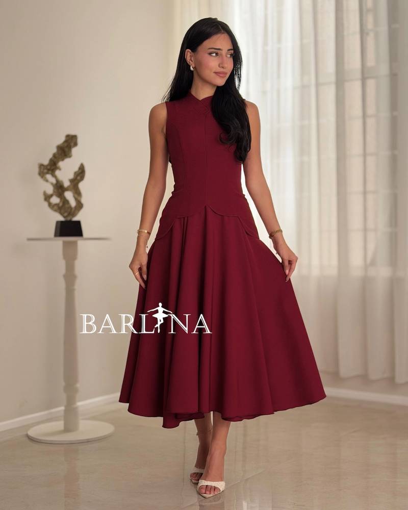 A burgundy dress with a defined waist