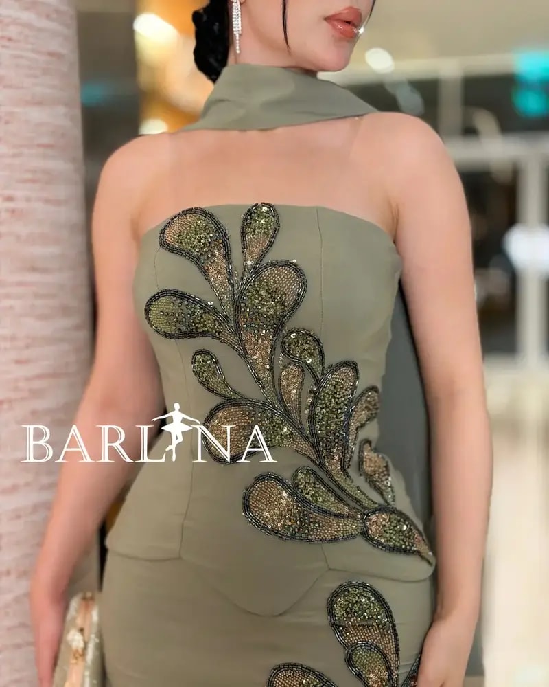 Olive green dress with shimmering bead embroidery