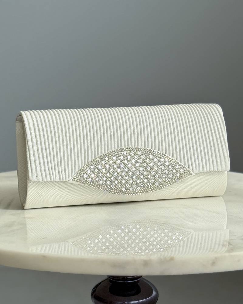 A bag decorated with a front panel made of rhinestones