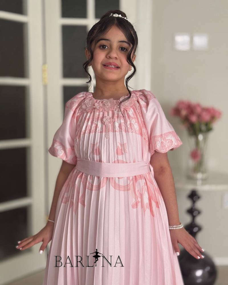 Soft pleated dress for girls with a wide cut