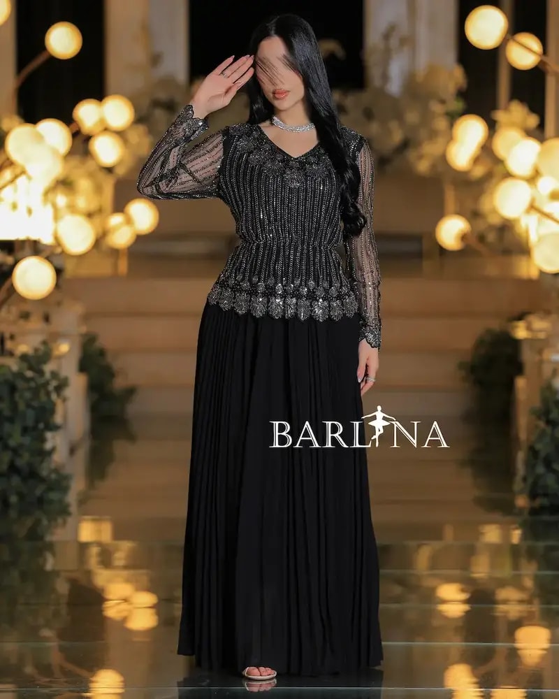 Luxurious dress with elegant sheer sleeves