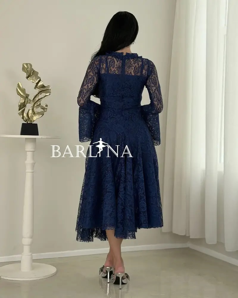 A soft dress adorned with elegant lace patterns