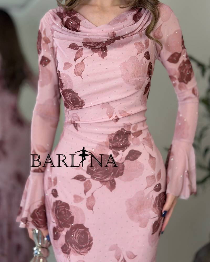A fitted dress in a pink floral print