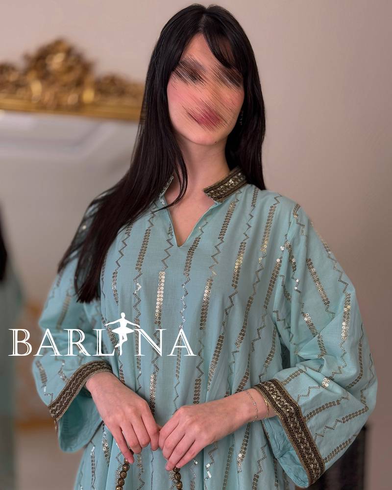 Turquoise jalabiya with shimmering gold embroidery
