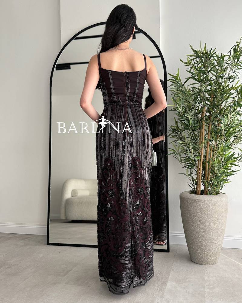 Dark brown dress adorned with artistic embroidery