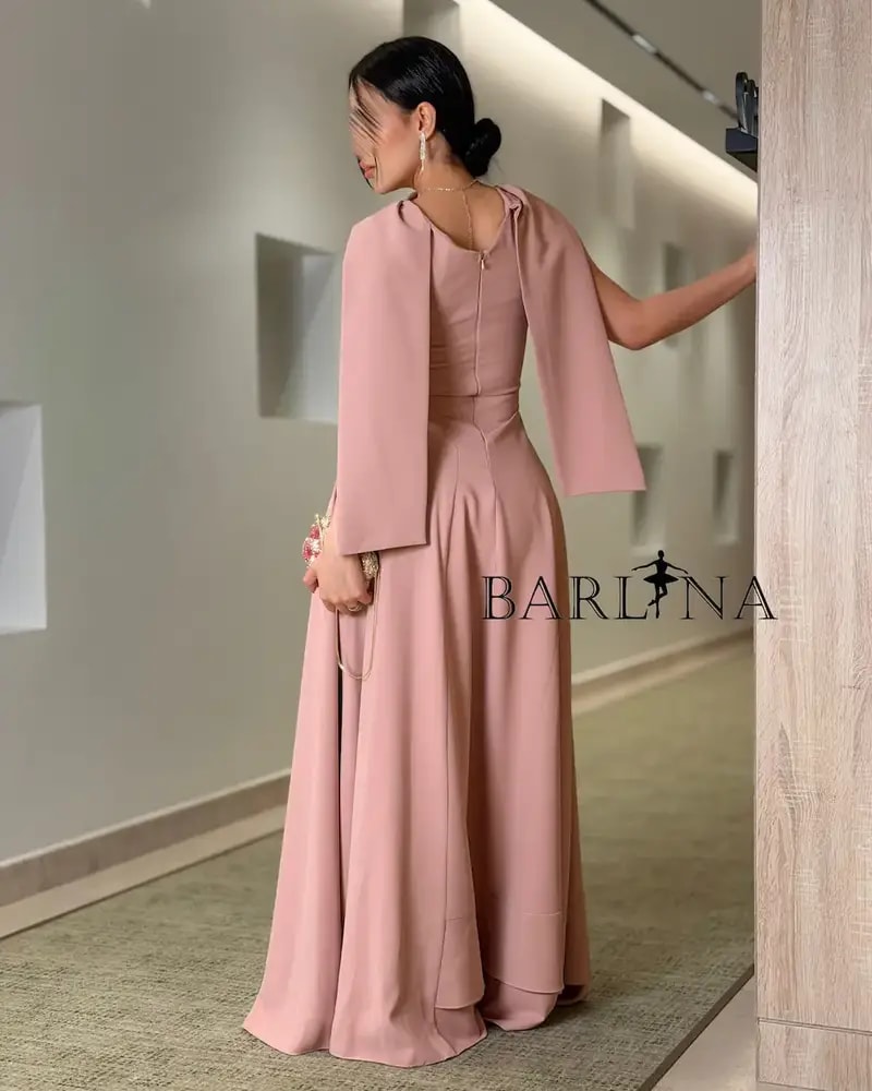 Soft, long pink dress with a simple design