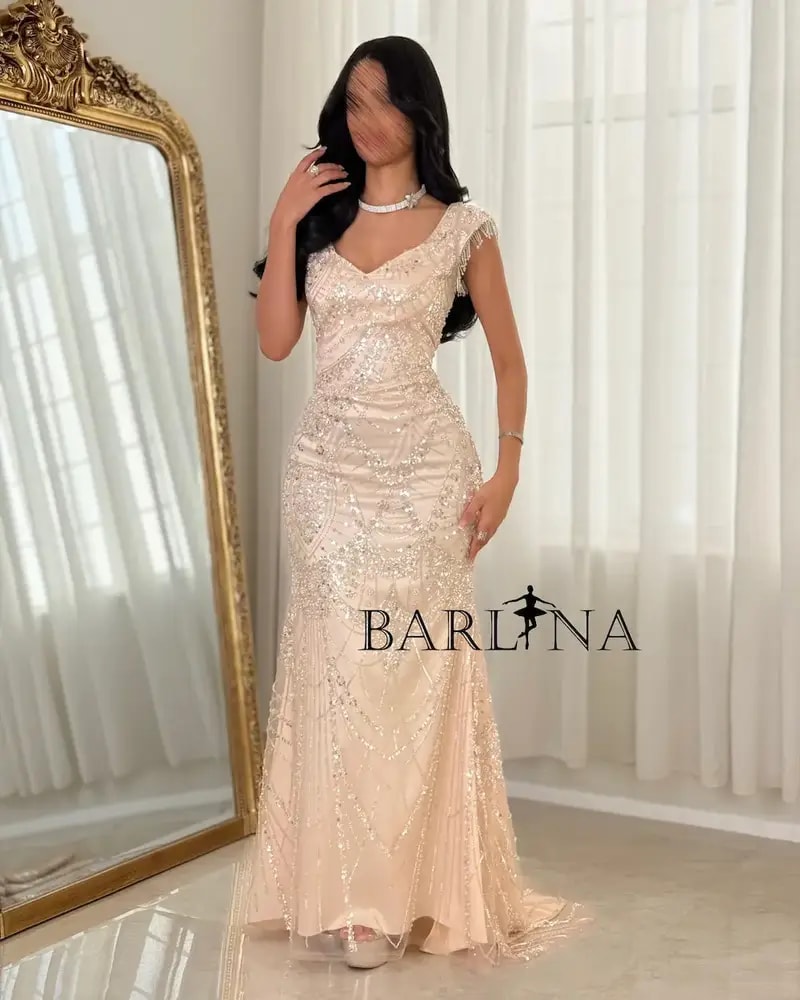Beige evening dress embroidered with matching sequins