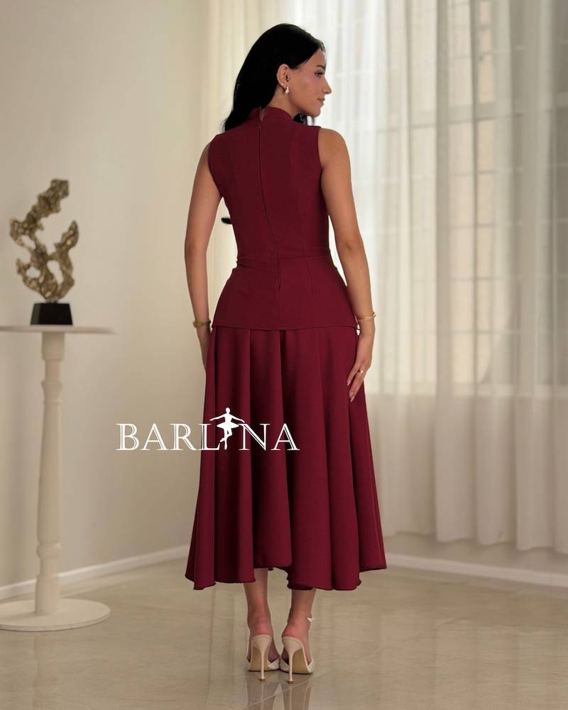 A burgundy dress with a defined waist