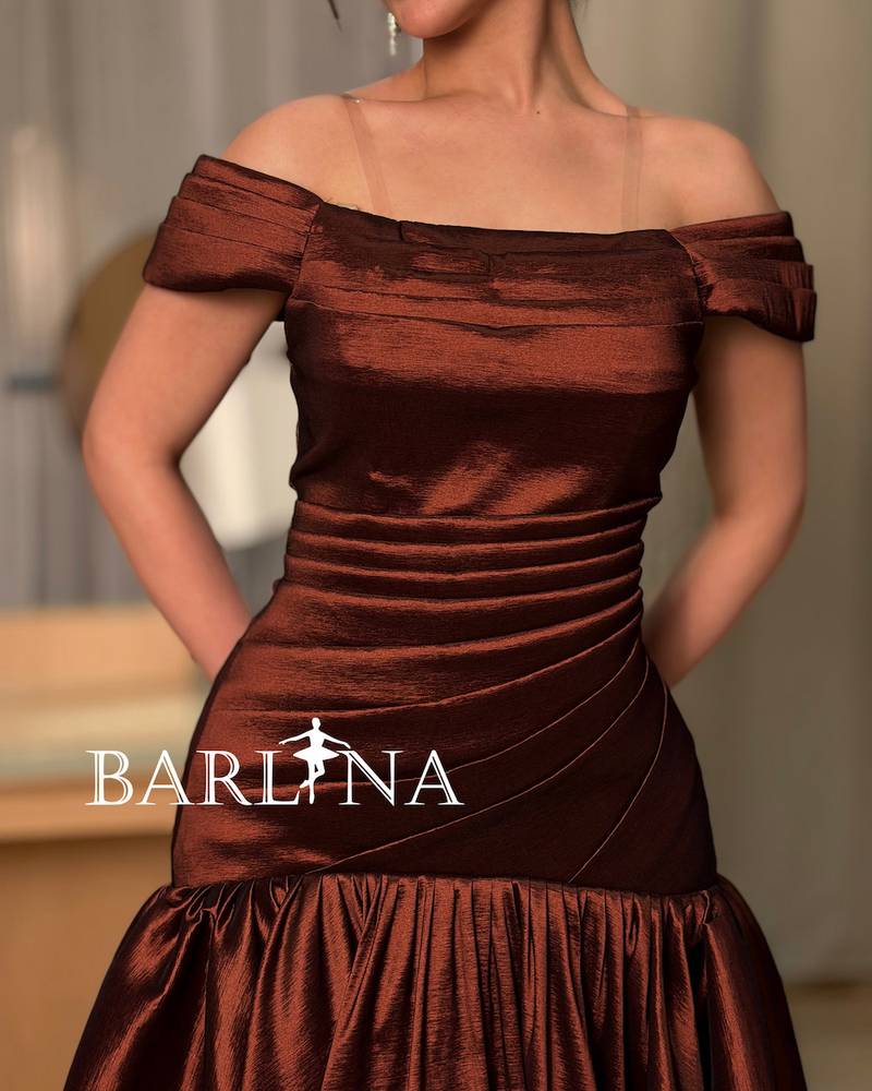 A shimmering off-the-shoulder evening dress