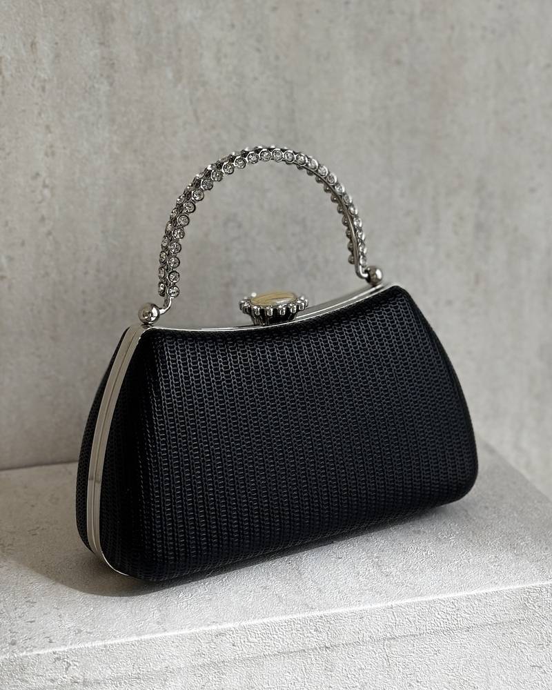 Handbag with a top handle, embellished with crystals