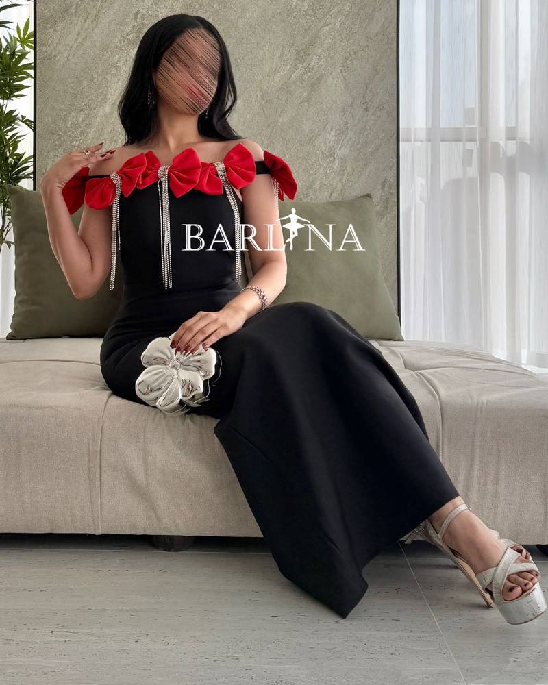 A classic black dress with bows