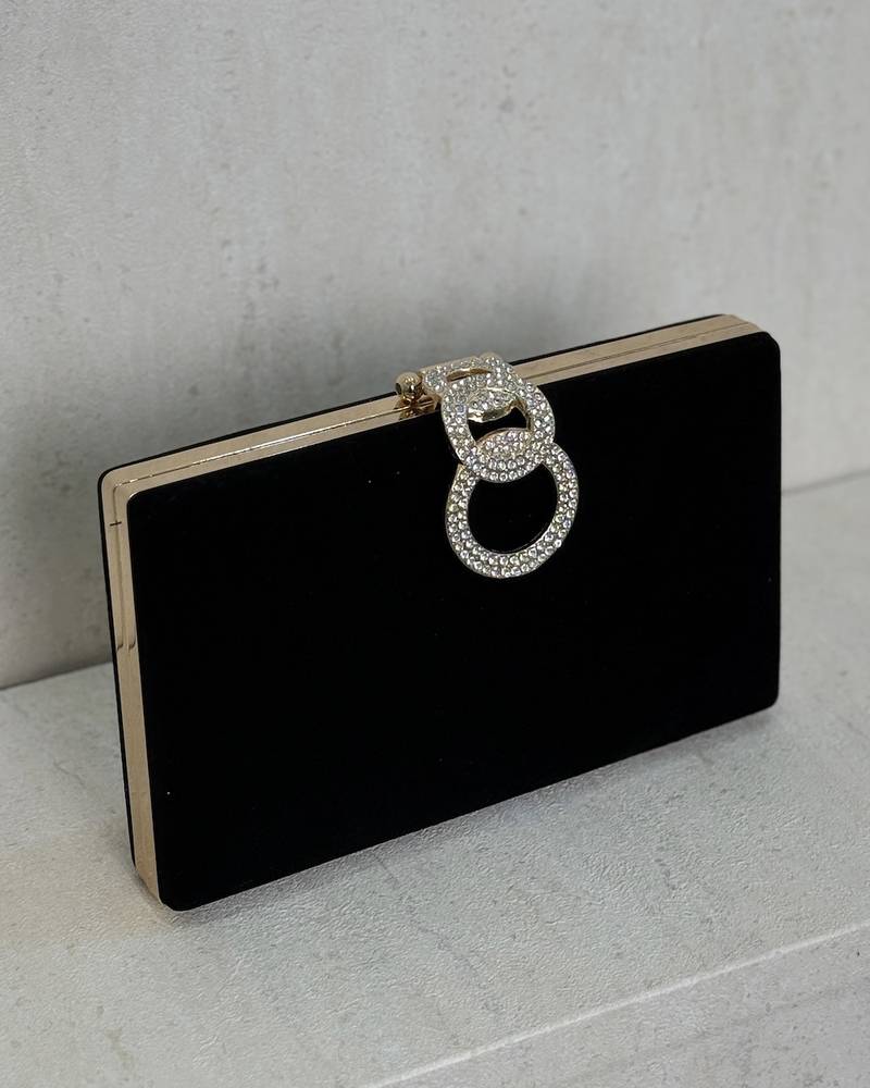 Velvet clutch bag with a gold frame