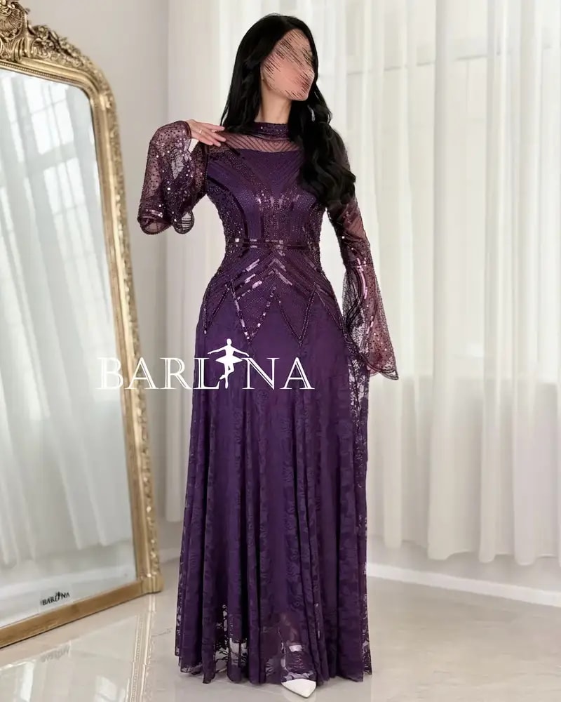 Luxurious purple evening dress with transparent sleeves