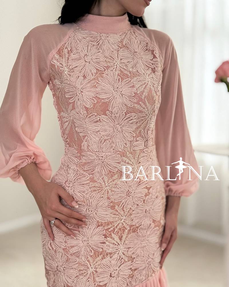 A soft pink dress with elegant embroidery
