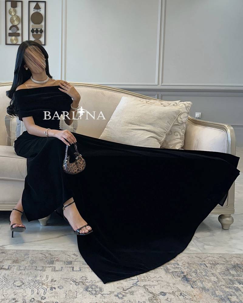 Black evening dress with side velvet tail