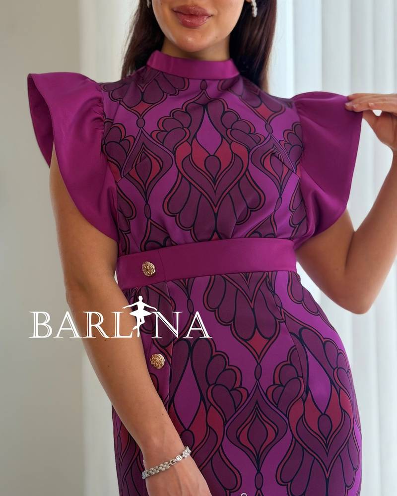 Purple dress with prominent ruffled sleeves
