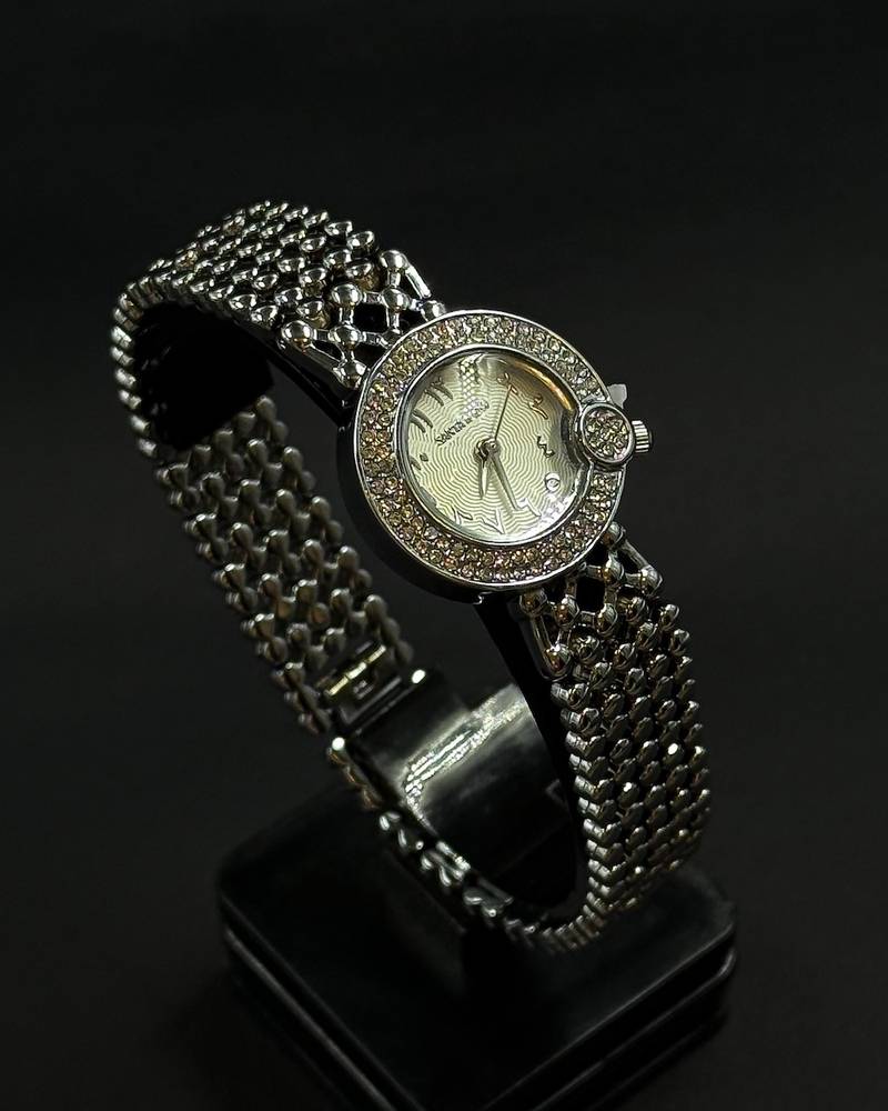 Women's watch with an elegant metal bracelet