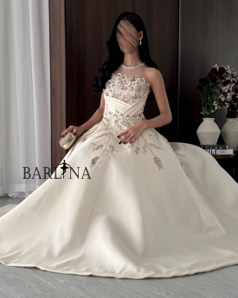 Beige evening dress with gold embroidery