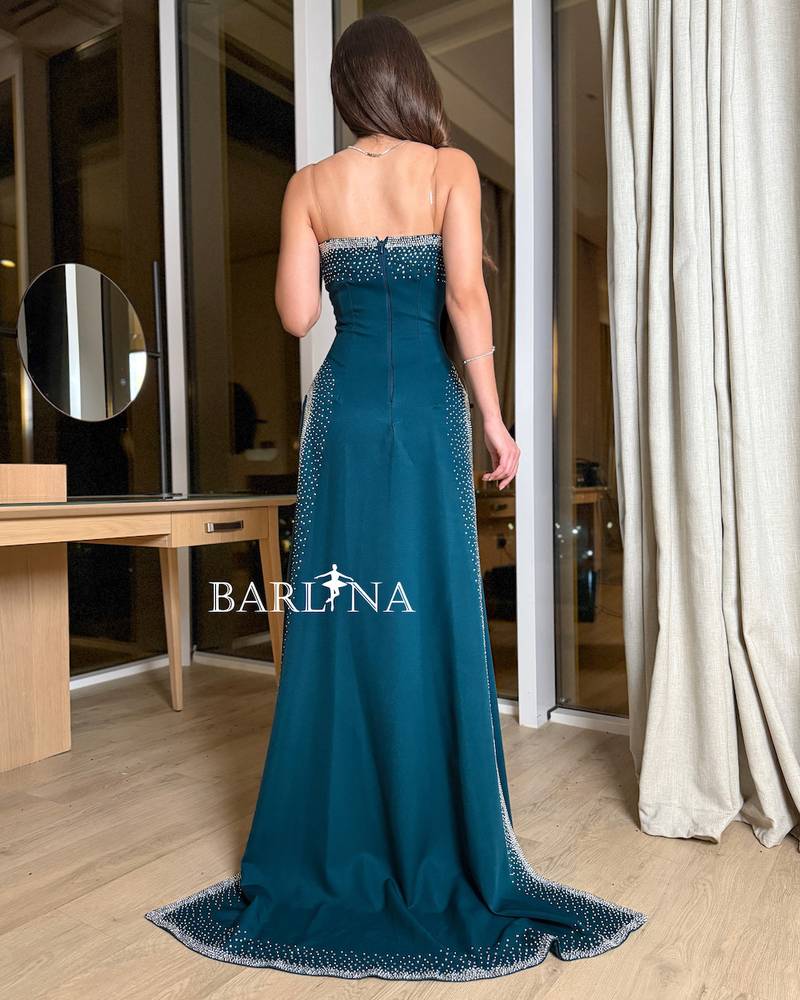 Petrol dress with elegant pearl details