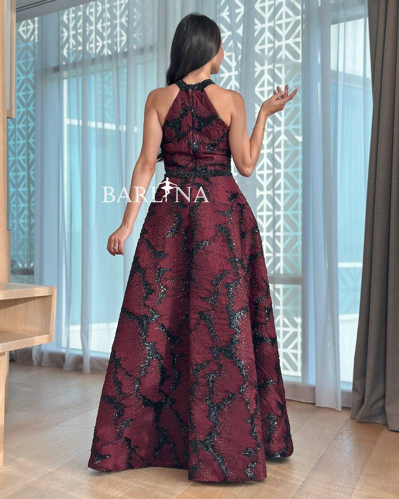 Elegant burgundy dress with black patterns