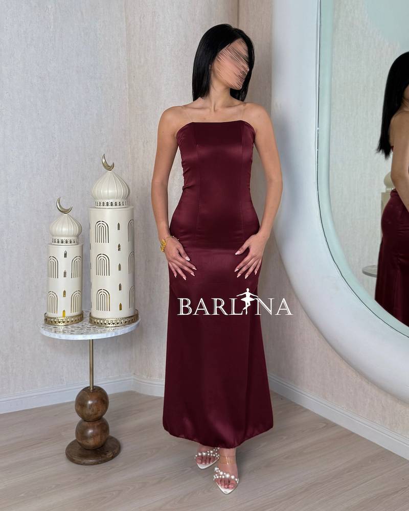 Red jalabiya with gold embroidery and an open cut