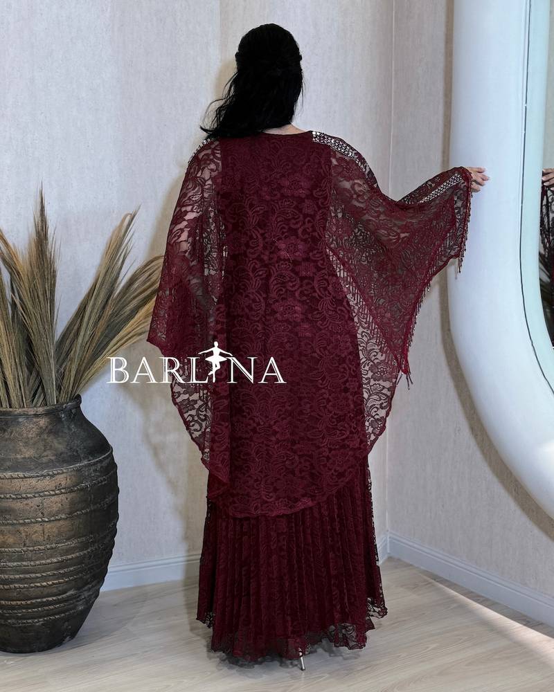 Burgundy lace dress with a wide sheer cape