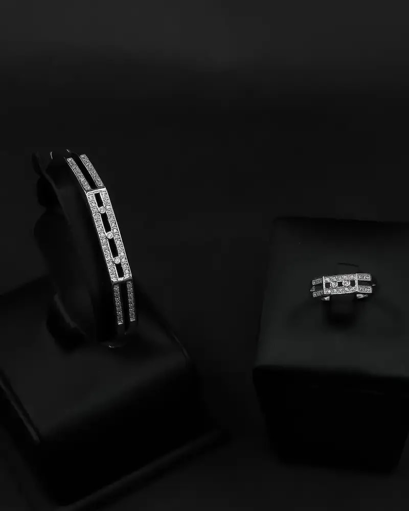 A delicate bracelet and ring with geometric, studded lines