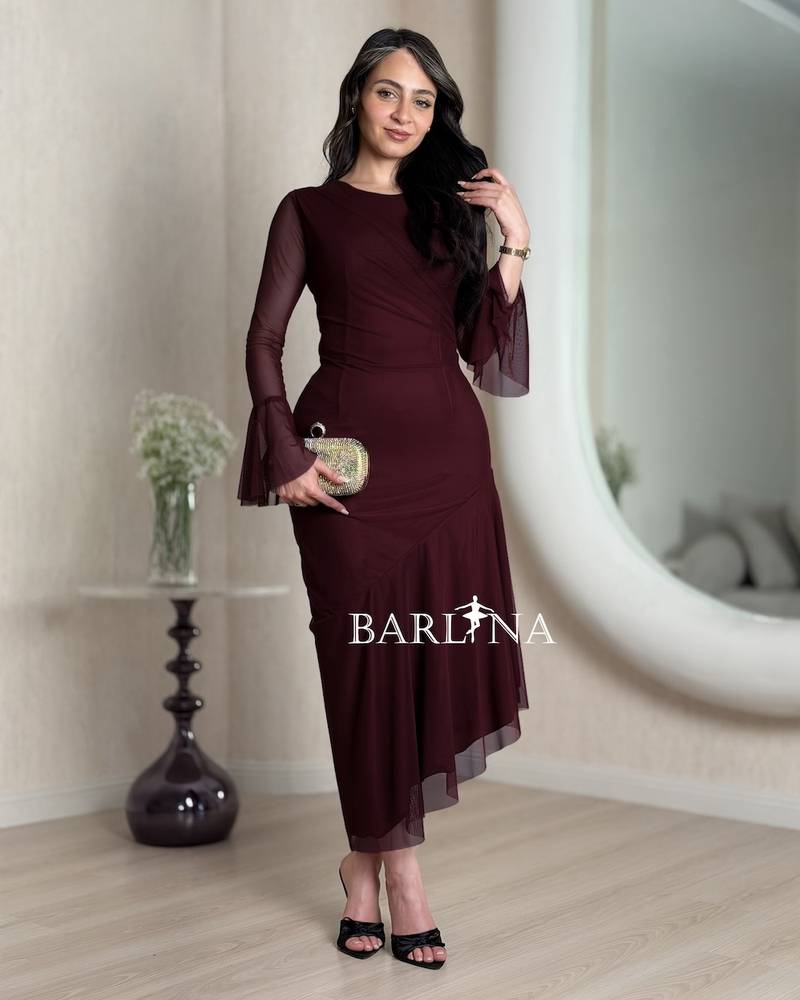 Burgundy dress with an asymmetrical cut