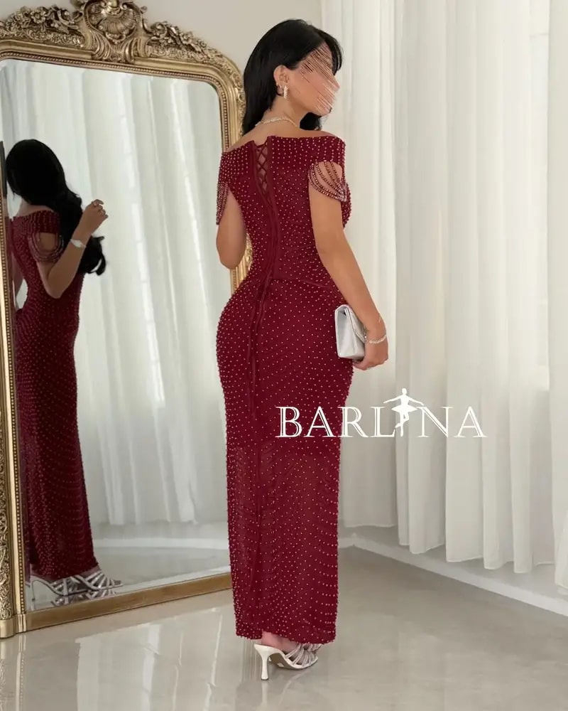 Burgundy evening dress fully embellished with pearls