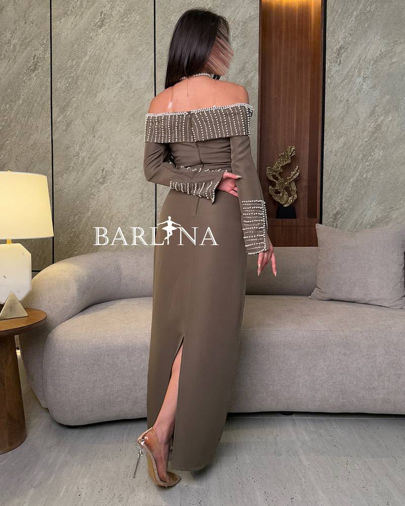 Brown dress decorated with shiny beads