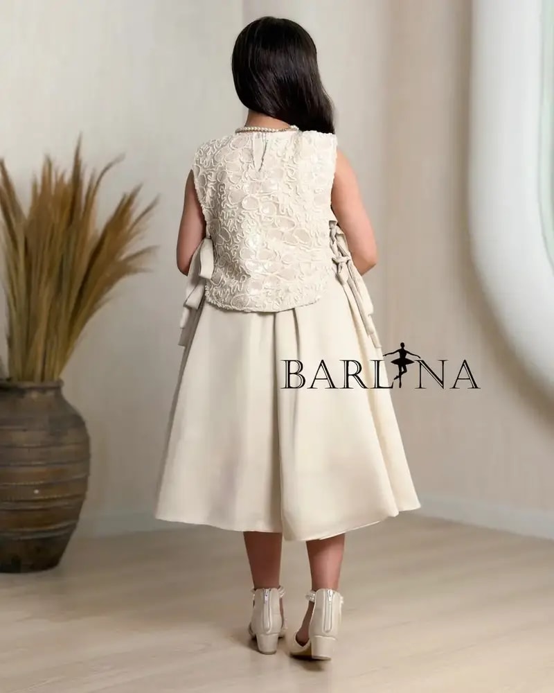 Elegant beige girls' dress with side tie