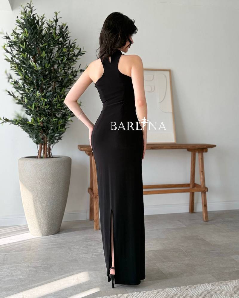 Black dress with a high neck and bare shoulders